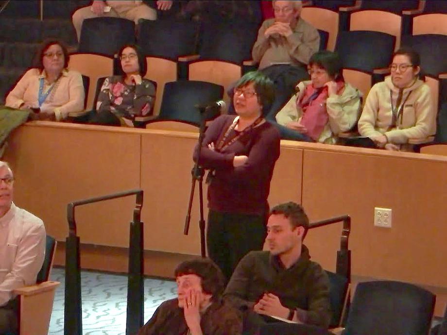 Person asking question at forum