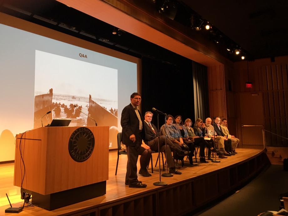 Forum with panel on stage