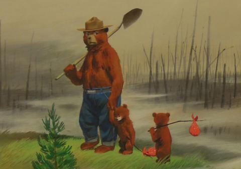Bear standing wearing jeans and a hat, carrying a shovel and leading two bear cubs